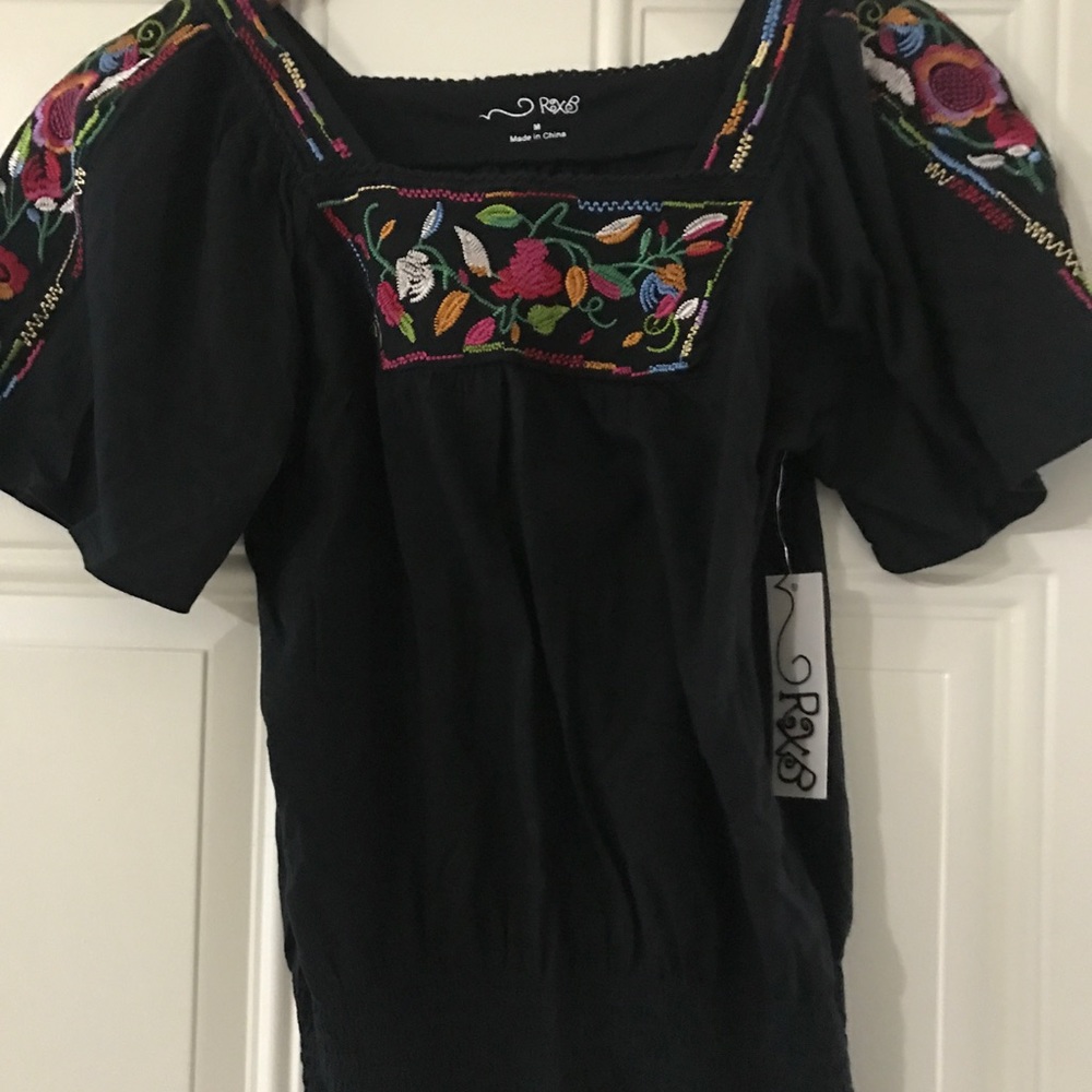 Black top with embroidery detail